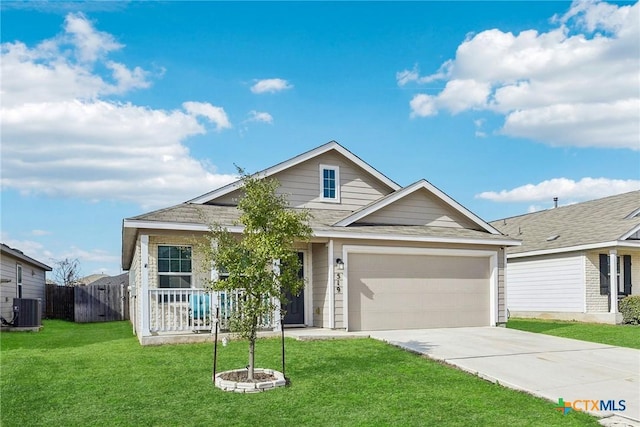 ranch-style home featuring a porch, central air condition unit, fence, driveway, and a front yard