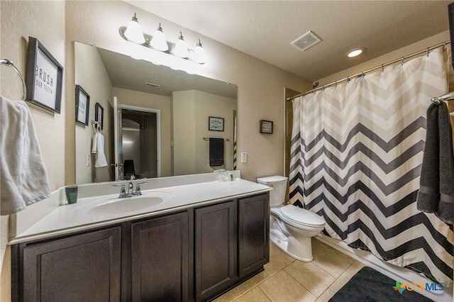 4431 Hogg, San Antonio, TX 78223 - bathroom featuring tile patterned flooring, vanity, a textured wall, a shower with shower curtain, and a textured ceiling