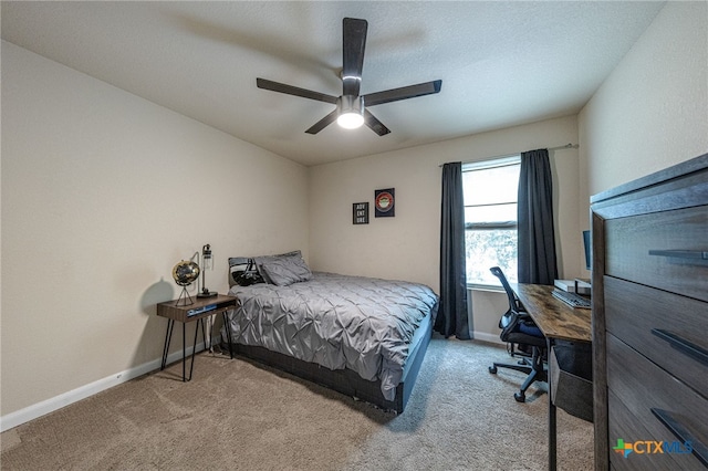 4431 Hogg, San Antonio, TX 78223 - carpeted bedroom with an office area and ceiling fan