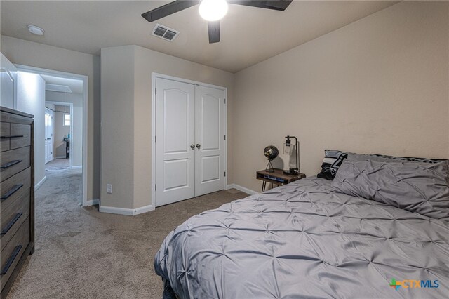 4431 Hogg, San Antonio, TX 78223 - bedroom featuring carpet, a closet, and ceiling fan