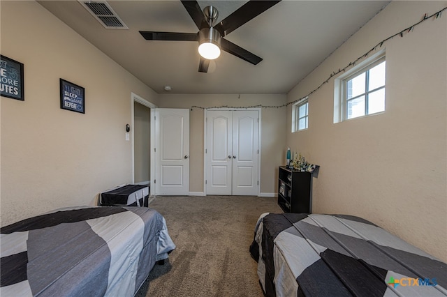 4431 Hogg, San Antonio, TX 78223 - bedroom featuring carpet flooring, ceiling fan, and a closet