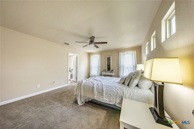 4431 Hogg, San Antonio, TX 78223 - carpeted bedroom with baseboards and ceiling fan