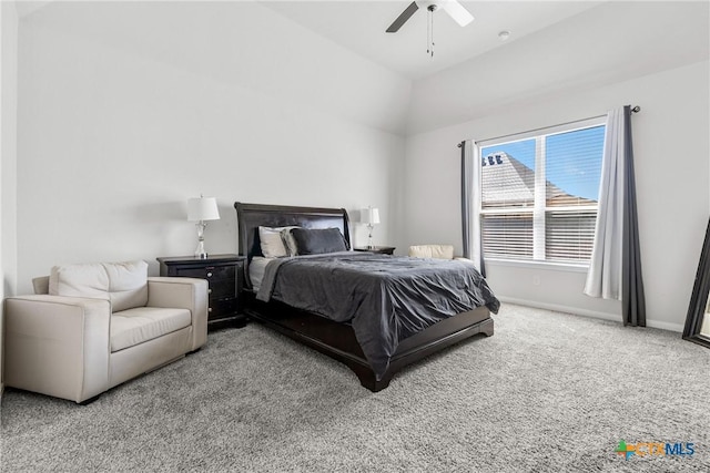 carpeted bedroom with lofted ceiling, baseboards, and ceiling fan