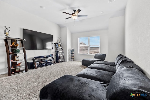 living room with visible vents, baseboards, lofted ceiling, carpet flooring, and a ceiling fan