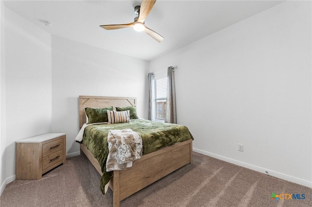 5903 Geronimo Vis, Seguin, TX 78155 - bedroom featuring light colored carpet, baseboards, and a ceiling fan