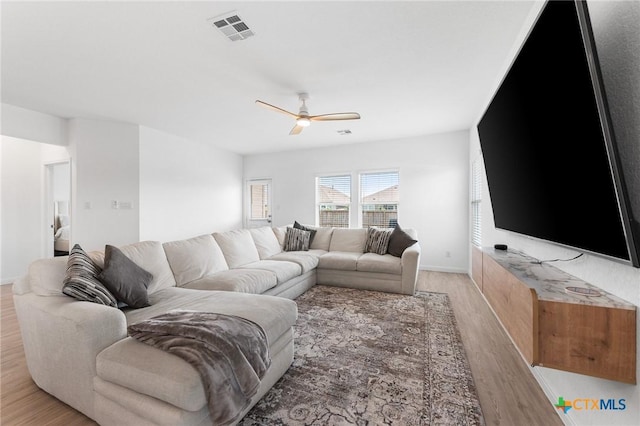 5903 Geronimo Vis, Seguin, TX 78155 - living area featuring ceiling fan and light wood-style flooring