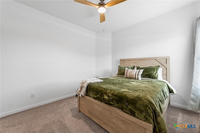 5903 Geronimo Vis, Seguin, TX 78155 - bedroom featuring carpet, baseboards, and a ceiling fan
