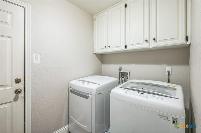 1811 Rally Ln, Harker Heights, TX 76548 - clothes washing area featuring cabinet space and independent washer and dryer