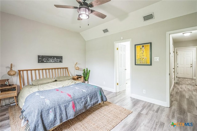 1811 Rally Ln, Harker Heights, TX 76548 - bedroom featuring wood finished floors, baseboards, vaulted ceiling, and a ceiling fan