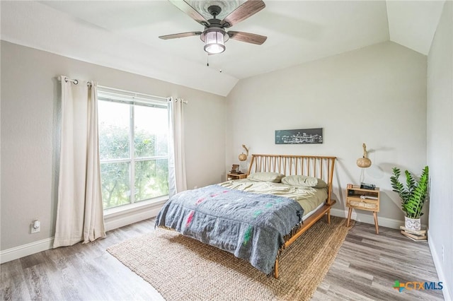 1811 Rally Ln, Harker Heights, TX 76548 - bedroom with vaulted ceiling, wood finished floors, baseboards, and ceiling fan