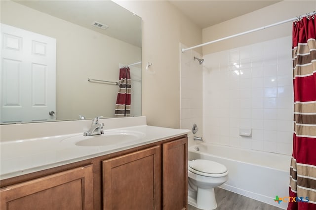 full bathroom with toilet, vanity, shower / tub combo, and hardwood / wood-style flooring