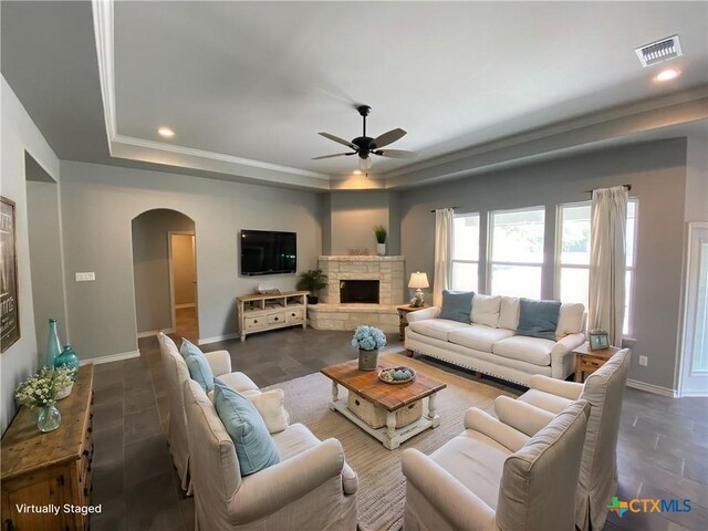 kitchen with sink, white cabinets, stainless steel appliances, and a kitchen island with sink