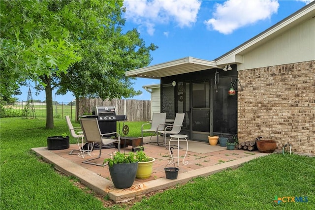 296 Valiant Wills Rd, Bruceville-Eddy, TX 76630 - view of patio with grilling area and a fire pit
