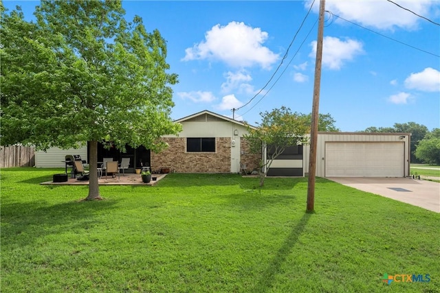 296 Valiant Wills Rd, Bruceville-Eddy, TX 76630 - view of front facade with concrete driveway, brick siding, and a garage