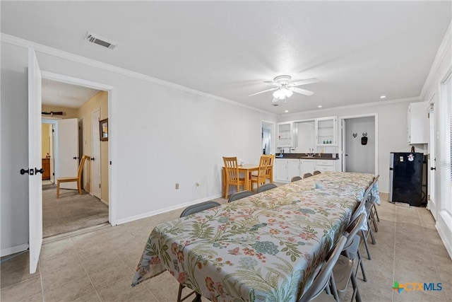 296 Valiant Wills Rd, Bruceville-Eddy, TX 76630 - dining area featuring light tile patterned floors, a ceiling fan, baseboards, crown molding, and recessed lighting