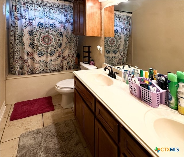 full bathroom featuring tile patterned floors, vanity, shower / bathtub combination with curtain, and toilet