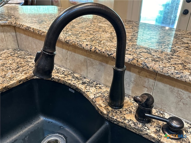 details with stone counters and sink