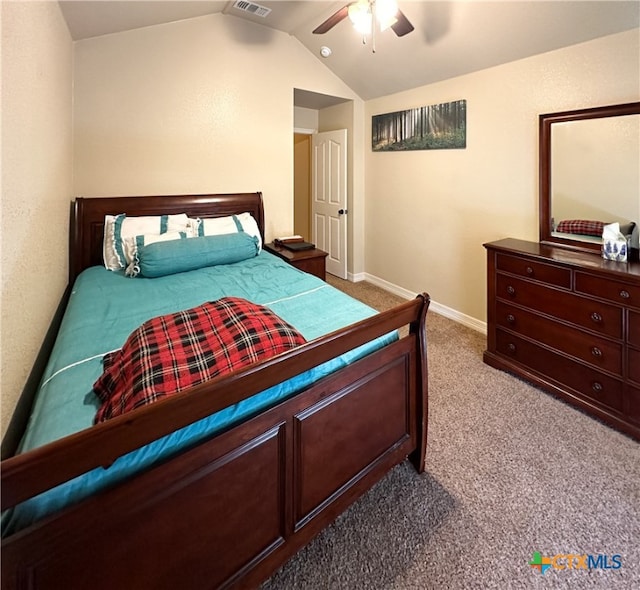 bedroom featuring ceiling fan, lofted ceiling, and light carpet