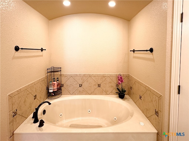 bathroom with a tub