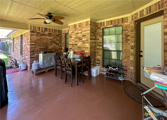 view of patio featuring ceiling fan