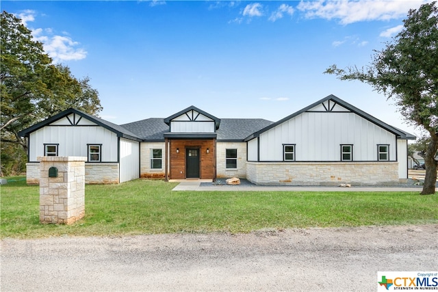 modern farmhouse with a front yard