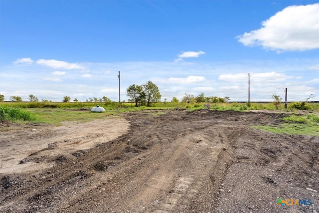 view of street featuring a rural view