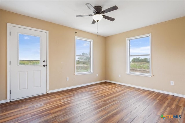 entrance foyer featuring hardwood / wood-style floors and ceiling fan