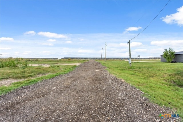 view of road with a rural view