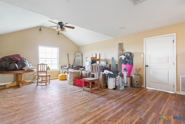 misc room with hardwood / wood-style floors, ceiling fan, and lofted ceiling