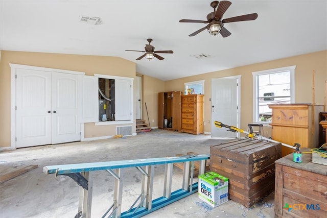 miscellaneous room featuring lofted ceiling and ceiling fan