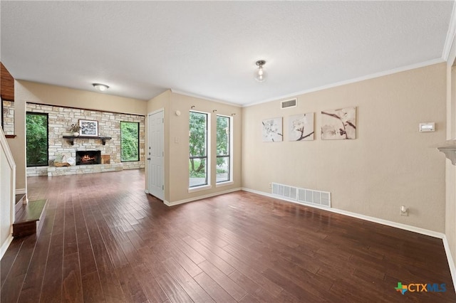 unfurnished living room featuring a fireplace, dark hardwood / wood-style floors, and ornamental molding