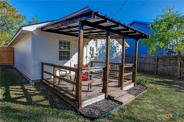 deck featuring a yard