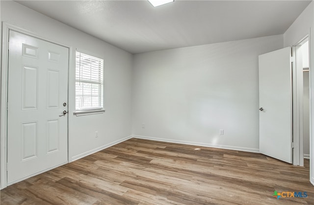 foyer entrance featuring light hardwood / wood-style flooring