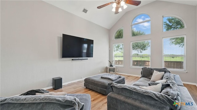 314 Cascades Cv, Cibolo, TX 78108 - living area featuring light wood-style floors, ceiling fan, and high vaulted ceiling