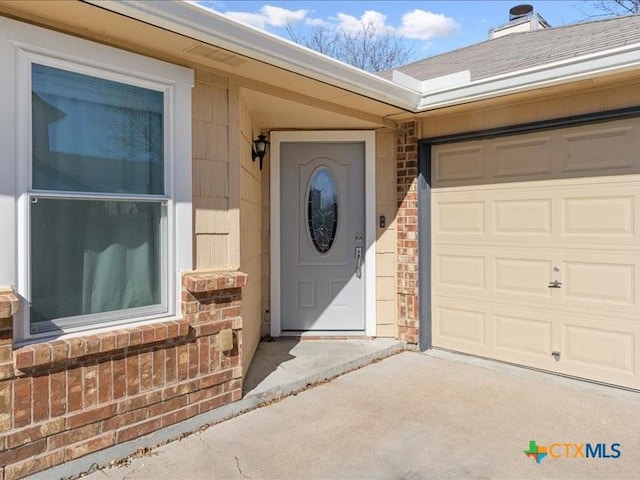 entrance to property with a garage