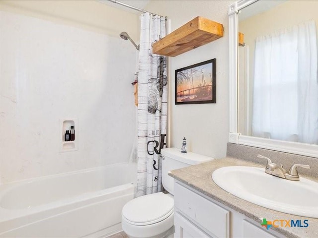 full bathroom with vanity, toilet, and shower / bath combo with shower curtain