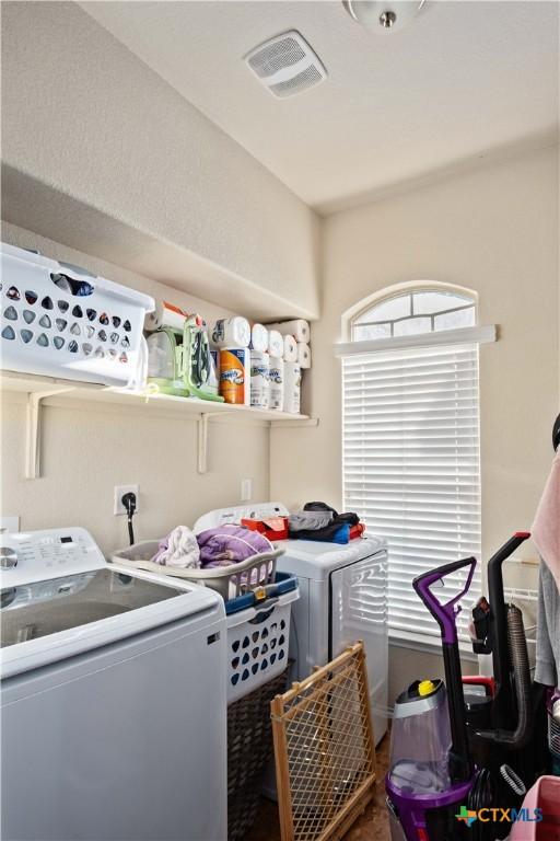 5310 Dauphin Dr, Belton, TX 76513 - laundry area with visible vents, washing machine and clothes dryer, and laundry area