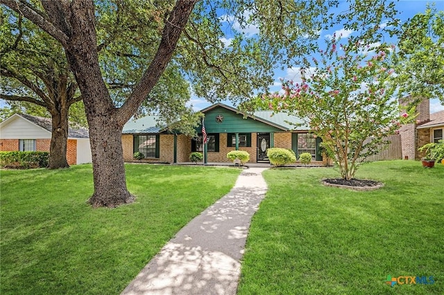 2209 Winchester Dr, Temple, TX 76502 - ranch-style house featuring brick siding and a front yard