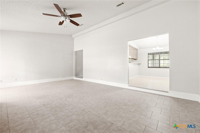 2209 Winchester Dr, Temple, TX 76502 - spare room with a ceiling fan and a chandelier