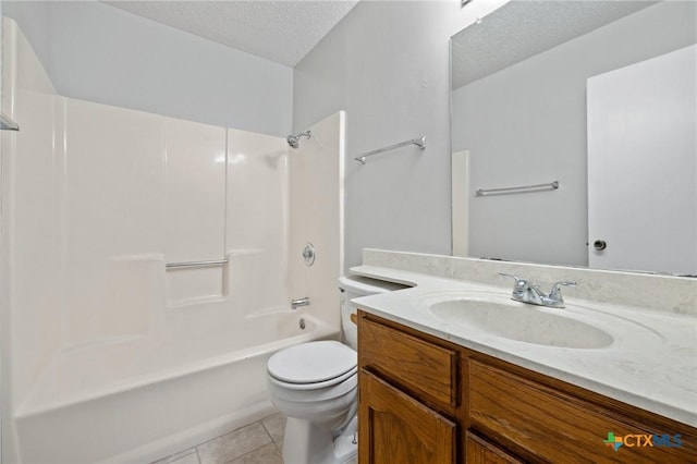 2209 Winchester Dr, Temple, TX 76502 - bathroom with vanity, tile patterned floors, bathing tub / shower combination, and a textured ceiling