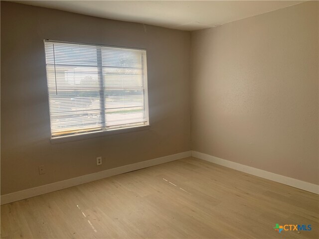 empty room featuring light wood-type flooring