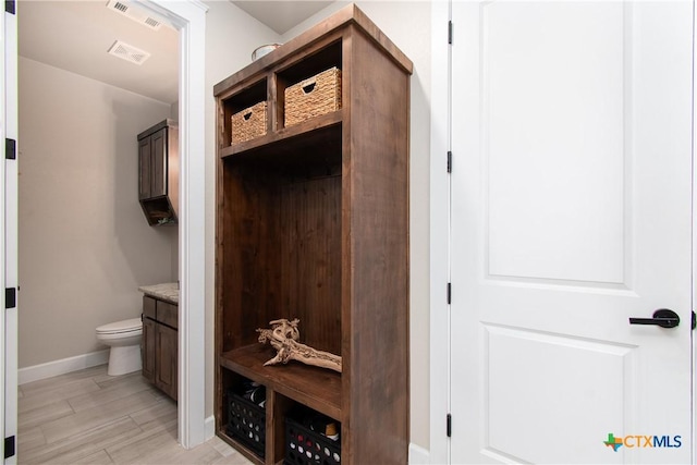 mudroom with light wood-type flooring