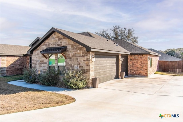 view of front of home with a garage