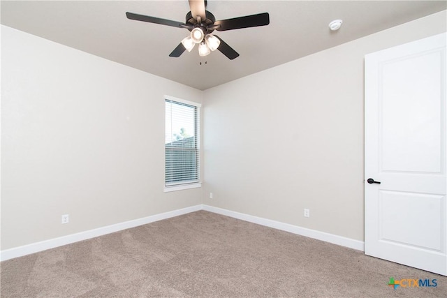 unfurnished room featuring carpet flooring and ceiling fan