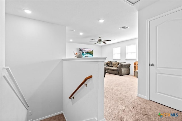 stairs featuring visible vents, a ceiling fan, recessed lighting, carpet flooring, and baseboards