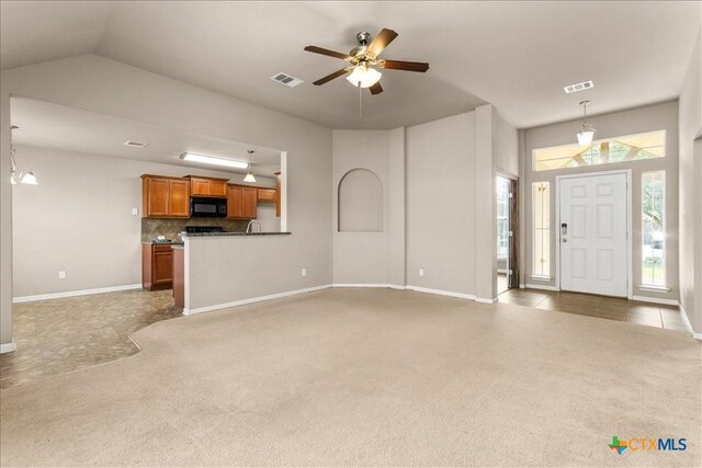 1220 Neuberry Cliffe, Temple, TX 76502 - unfurnished living room featuring light carpet, ceiling fan, and baseboards