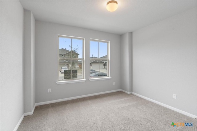 view of carpeted spare room