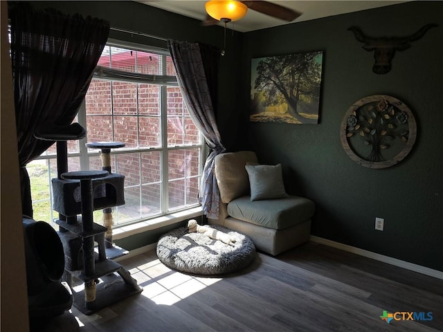2301 Jake Dr, Copperas Cove, TX 76522 - living area featuring wood finished floors, ceiling fan, and baseboards