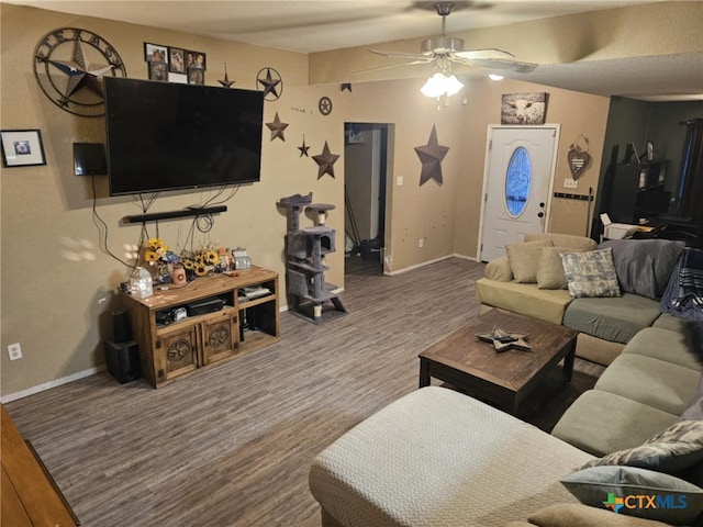 living room with hardwood / wood-style floors and ceiling fan