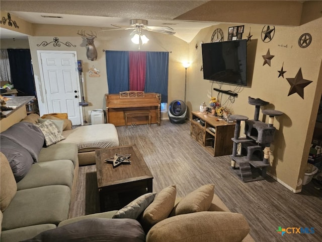 living room with carpet flooring and ceiling fan